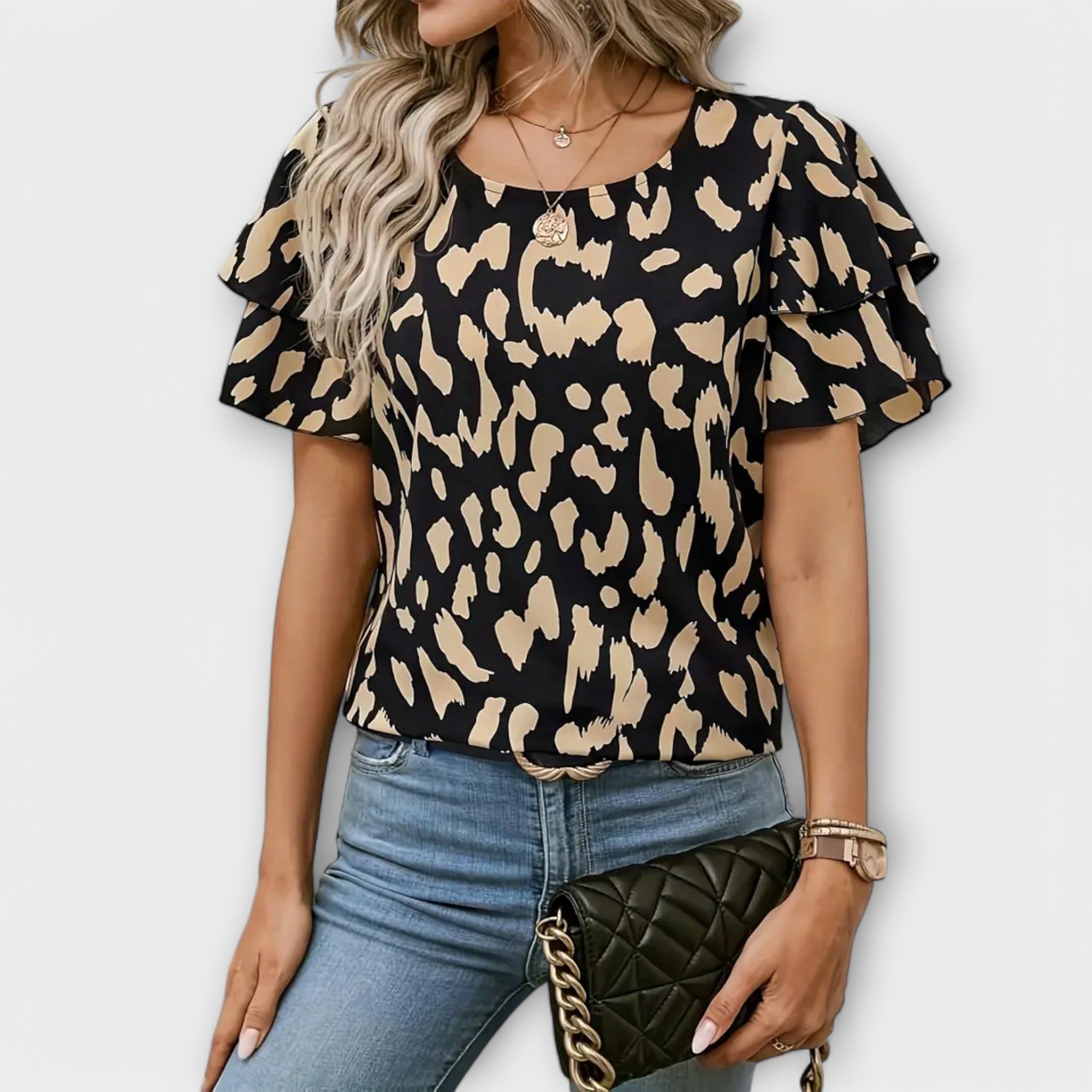 Lela – Stilfuld bluse med leopardærmer